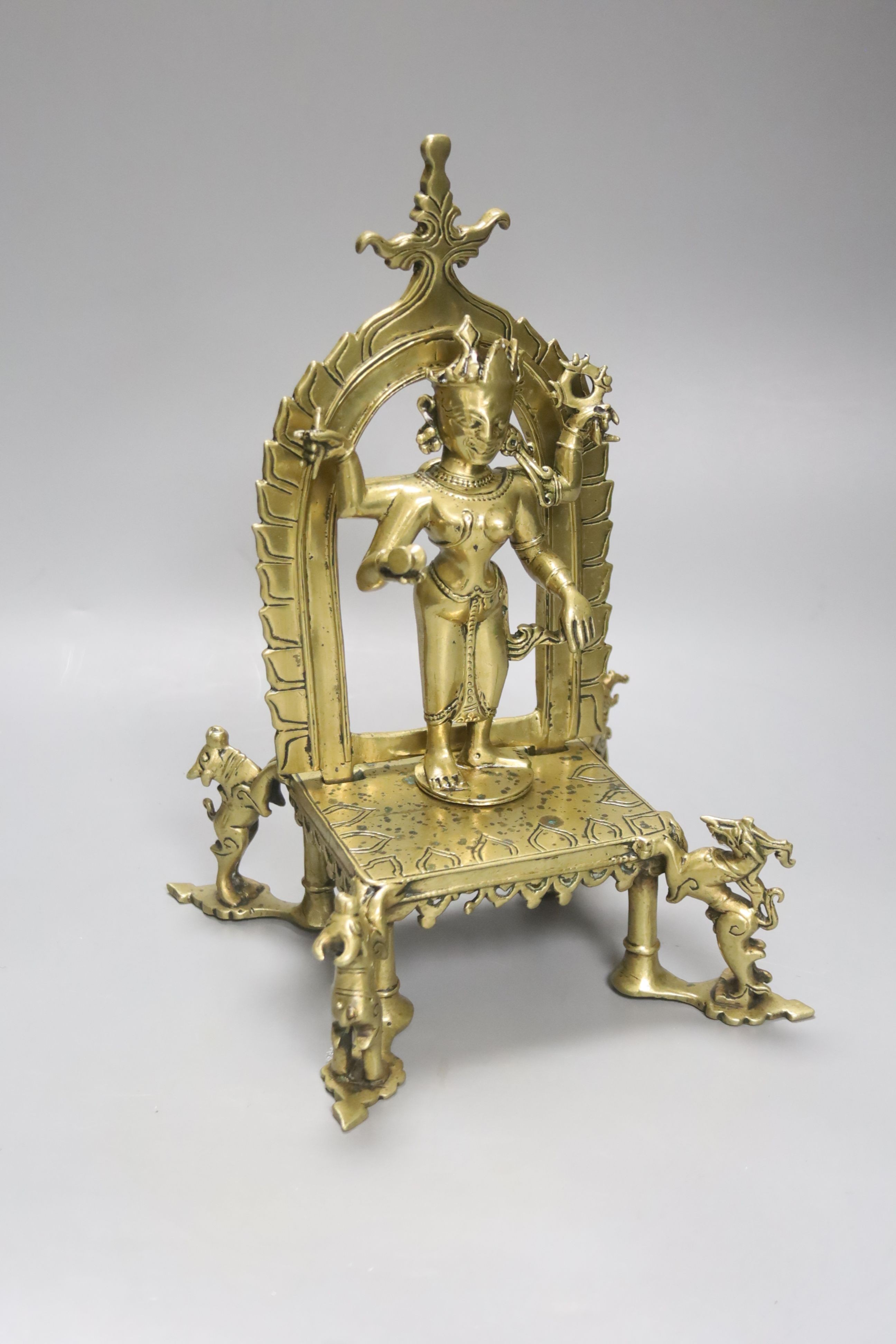 A brass / bronze Indian shrine, height 26cm